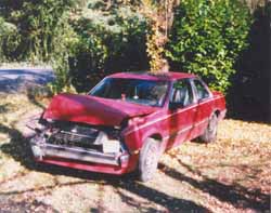 Photograph of a Wrecked Car